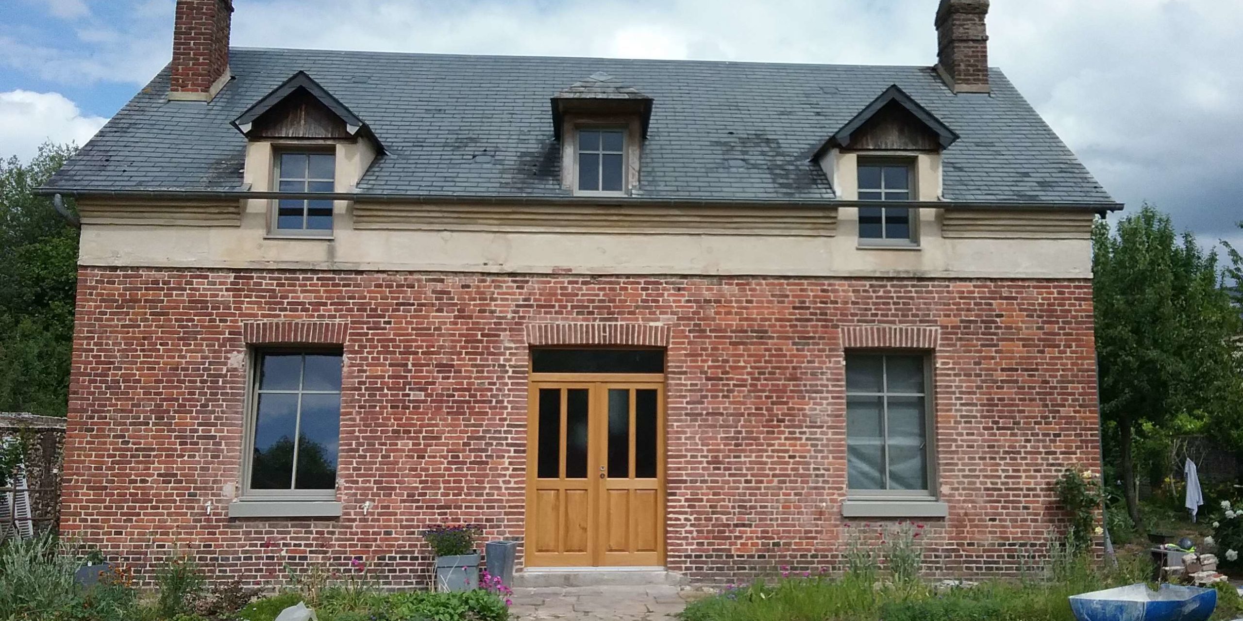 Rénovation BBC maison en briques Orbec (14) - Biomasse Normandie